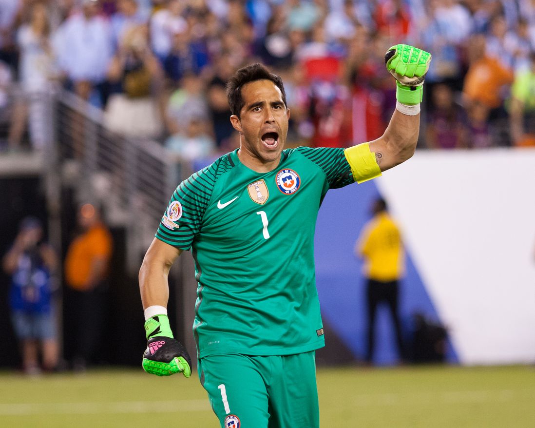 Chile goalkeeper Claudio Bravo reacts after saving Lucas Biglia's attempt during the penalty-kick shootout.